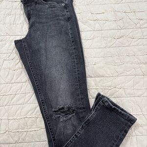 Black distress mid rise skinny jean